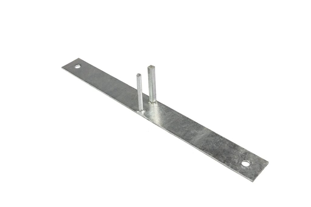 A flat metal bracket with two holes at each end and two vertical metal rods of different heights attached near one end, set against a white background.
